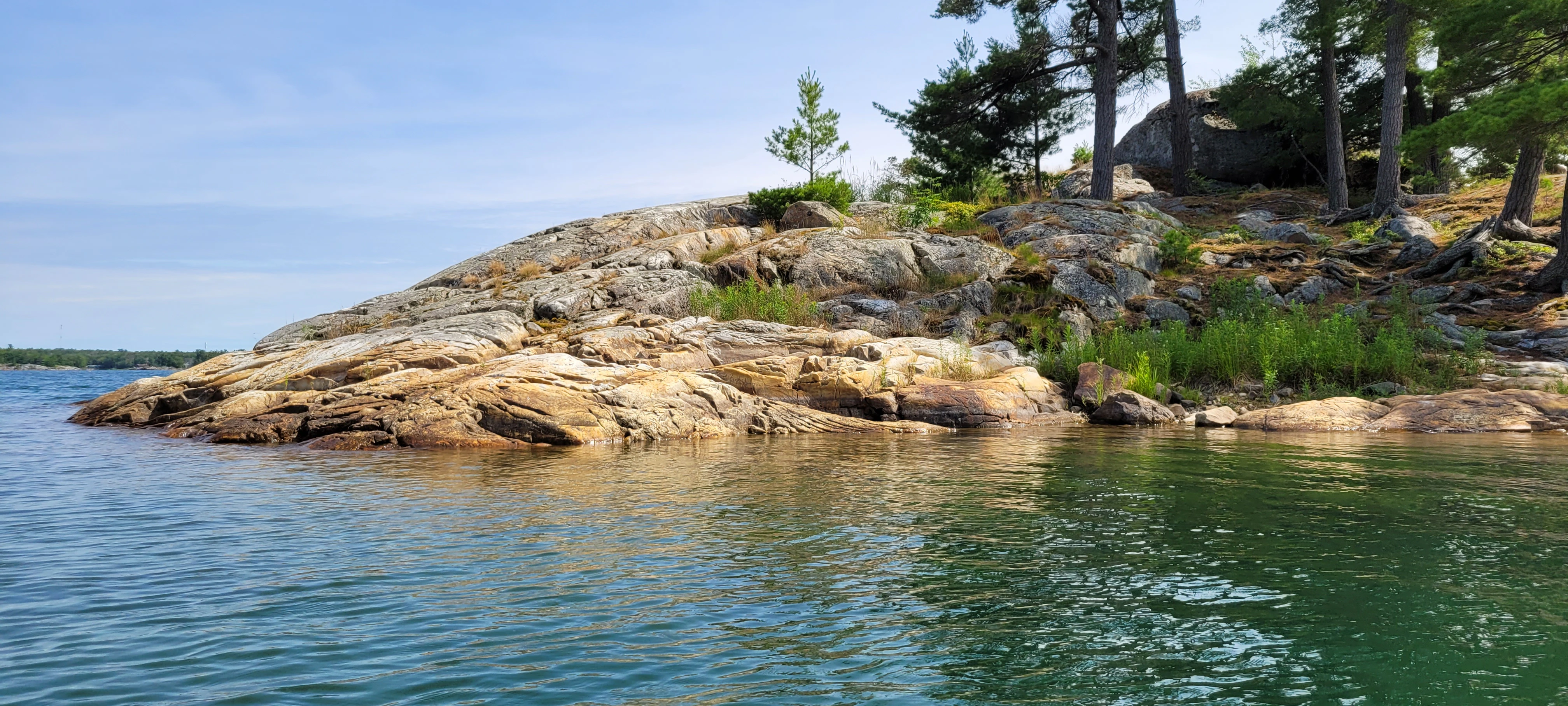 Calm waters leading toward Indian Head Cove in Killarney Bay